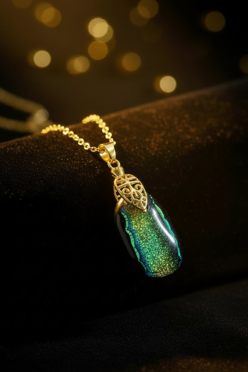 Dichrioc glass pendant - blue green gold hues
