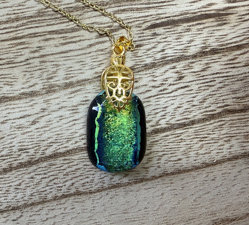 Dichrioc glass pendant - blue green gold hues