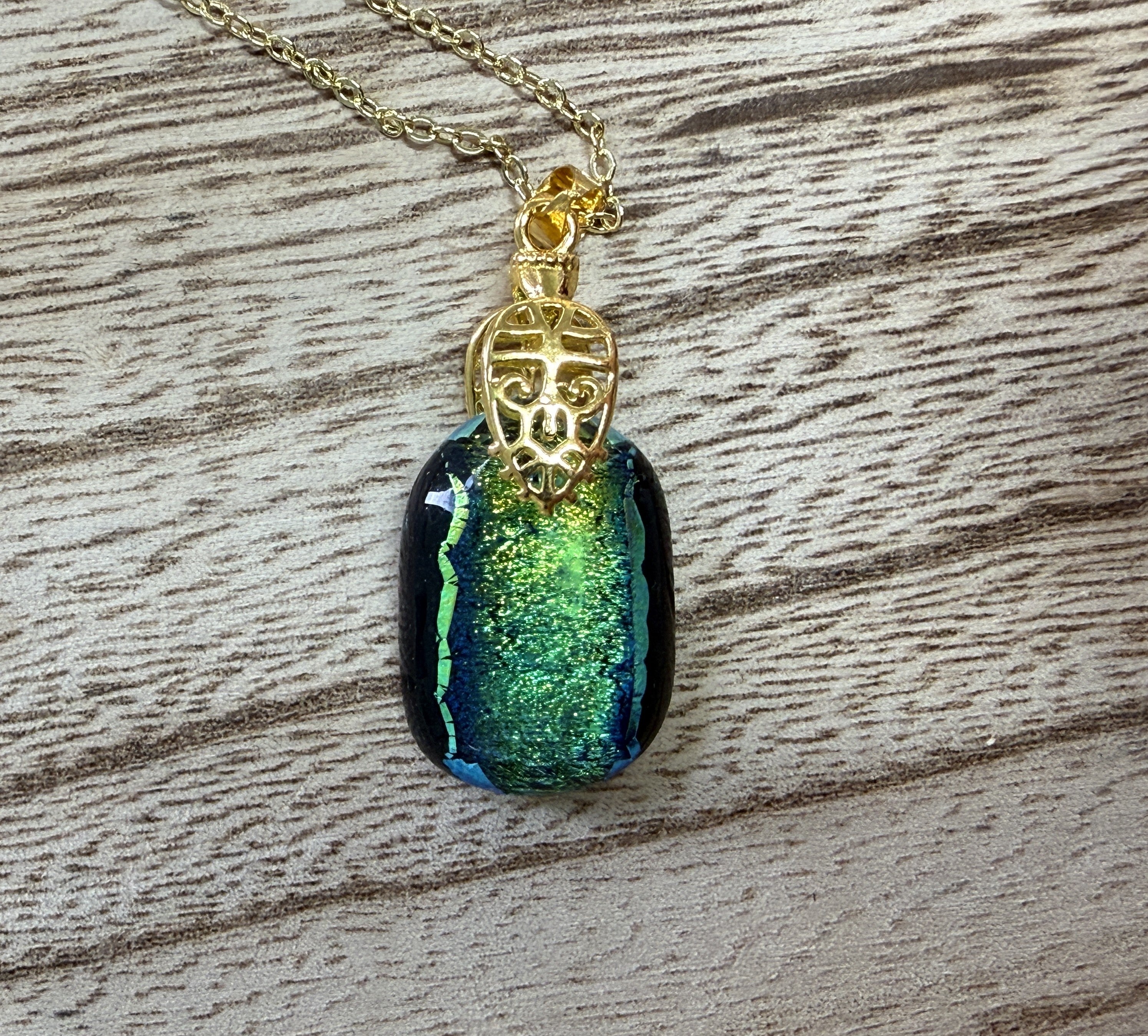 Dichrioc glass pendant - blue green gold hues